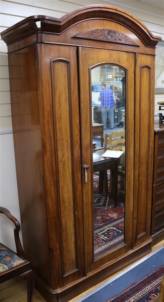A Victorian mahogany mirrored wardrobe with interior fitments W.128cm,